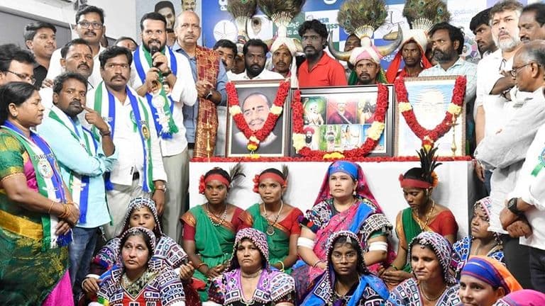 YSRCP tribal leaders participating in International Day of the World's Indigenous Peoples celebrations at the YSRCP Central Office in Tadepalli.